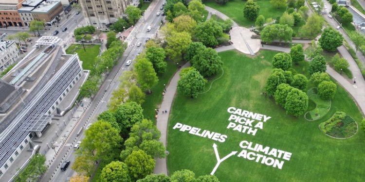 95-Metre ‘Mega-Banner’ Urges Carney to Pick a Path, Choose Renewables and Climate Action